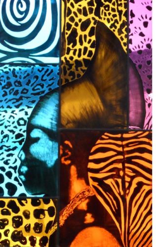 A photograph of a stained glass panel showing the silhouette of a black woman wearing a head dress in profile against a colourful, patterned background