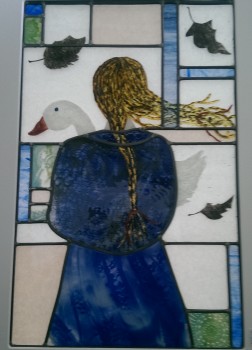 stained glass panel with figure and goose