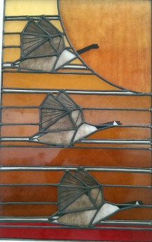 Stained glass panel with three geese