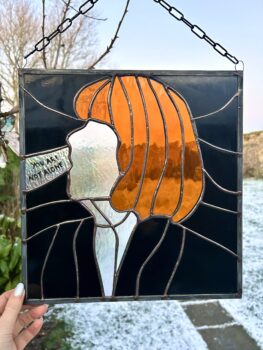 Gisele Pelicot stained glass portrait
